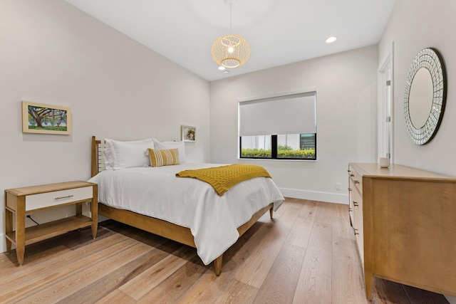 bedroom featuring light wood-type flooring