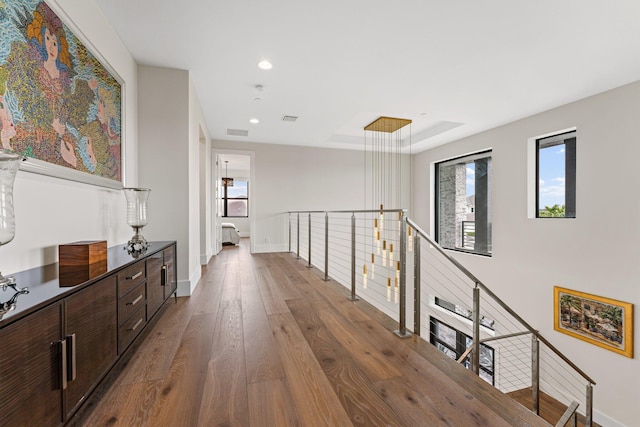 hallway featuring dark hardwood / wood-style flooring