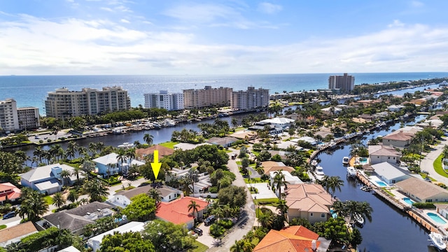 aerial view featuring a residential view and a water view