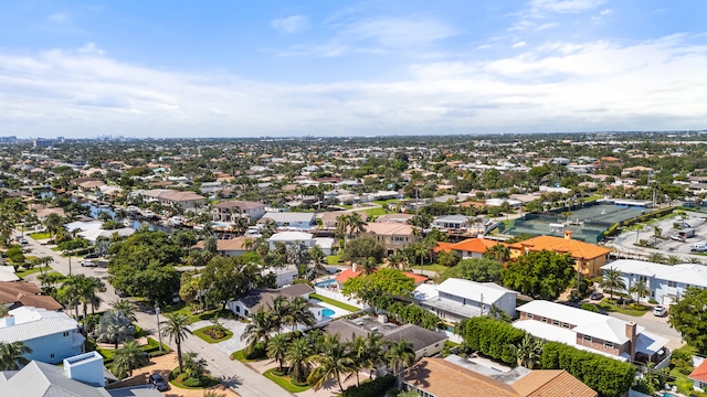 birds eye view of property with a residential view