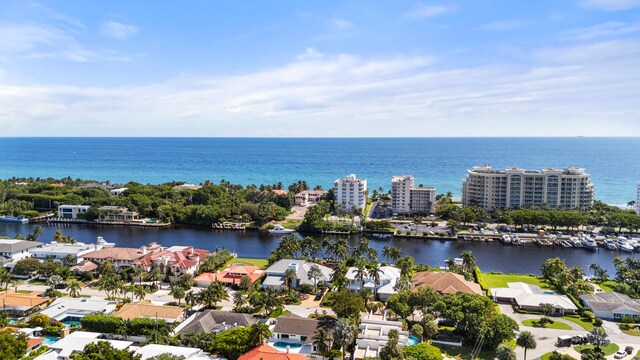 aerial view featuring a residential view and a water view