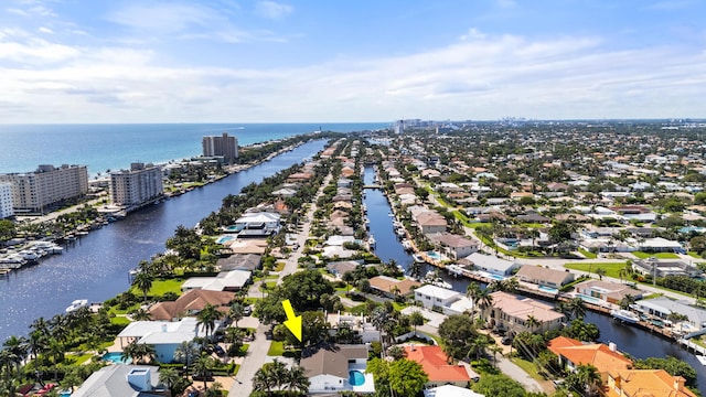 birds eye view of property featuring a residential view and a water view