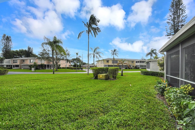 view of yard featuring a residential view