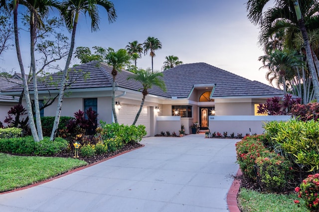 view of front of home with a garage