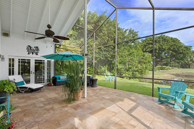 view of patio / terrace with ceiling fan, french doors, and glass enclosure