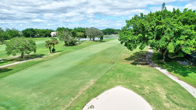 surrounding community featuring a yard