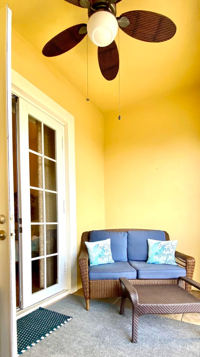 view of patio featuring ceiling fan