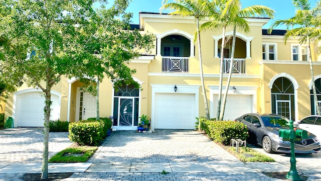 view of front of property with a balcony