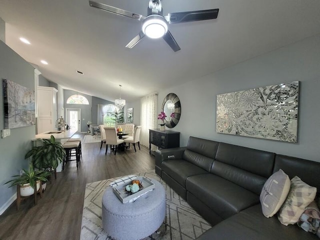 living room featuring vaulted ceiling, ceiling fan, hardwood / wood-style floors, and sink