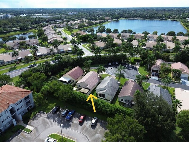 drone / aerial view with a water view