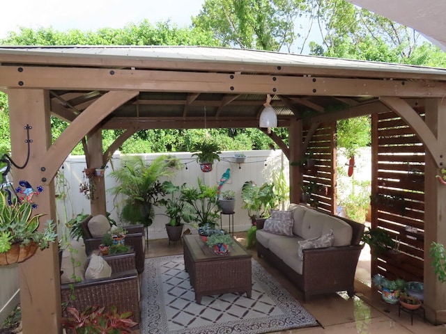 view of patio / terrace with an outdoor living space and a gazebo