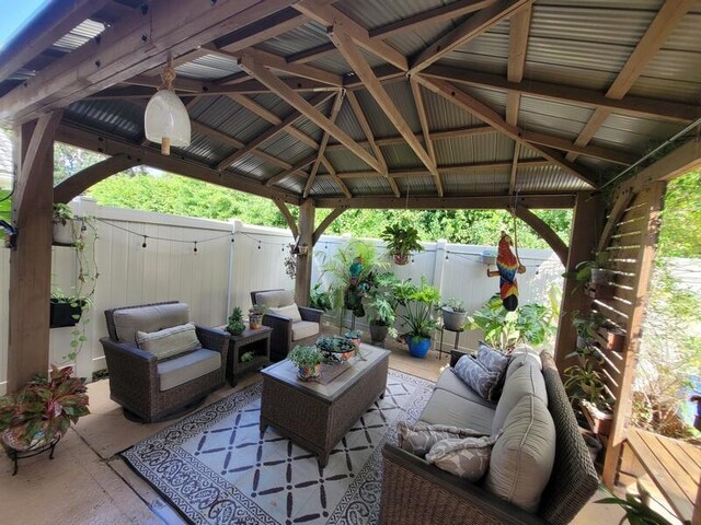 view of patio with an outdoor hangout area and a gazebo