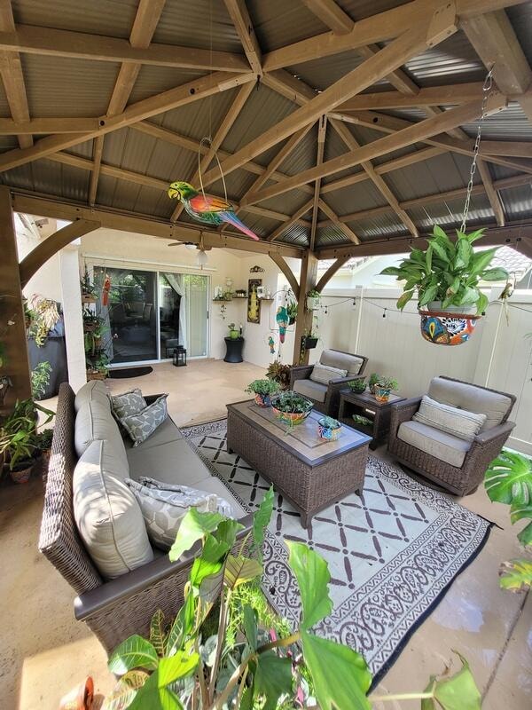 view of patio / terrace with an outdoor hangout area and a gazebo