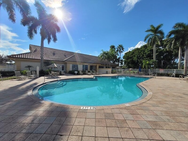 view of swimming pool featuring a patio