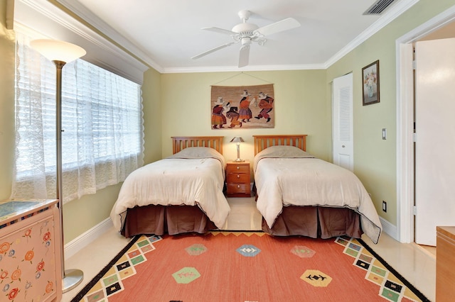 bedroom featuring hardwood / wood-style floors, ceiling fan, and crown molding