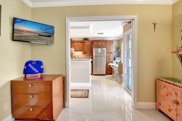 2721 SW 15th St Unit 203, Delray Beach, FL 33445 - hallway featuring ornamental molding, baseboards, and light tile patterned flooring