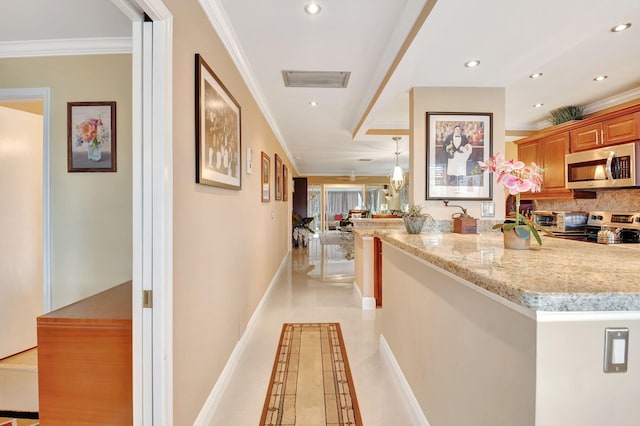 corridor featuring ornamental molding