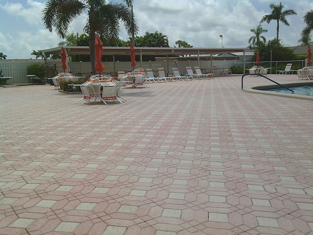 view of swimming pool featuring a patio area