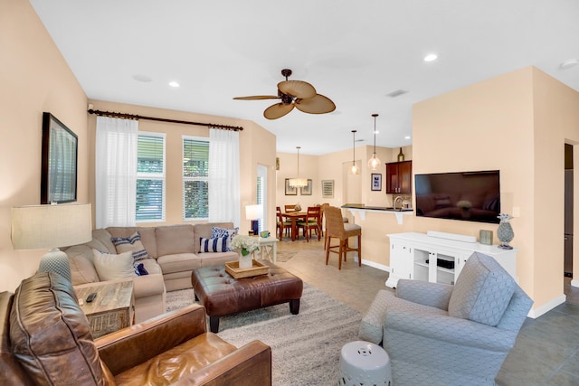 living room featuring ceiling fan