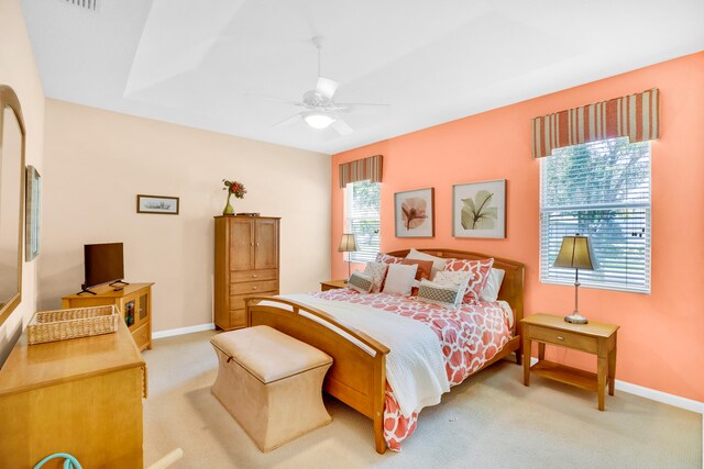 carpeted bedroom featuring ceiling fan