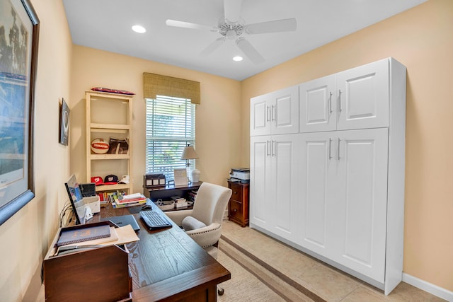 office area with ceiling fan and light tile patterned floors