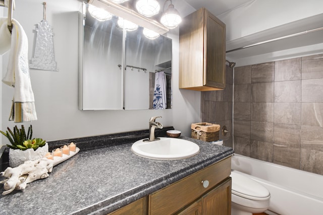 full bathroom featuring vanity, toilet, and shower / bath combo with shower curtain