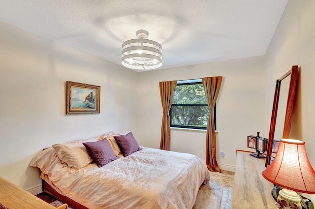 bedroom with light hardwood / wood-style flooring