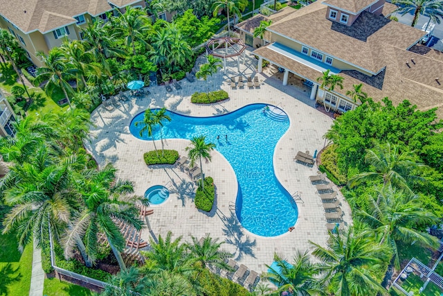 view of swimming pool featuring a patio area