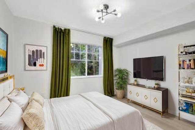 bedroom with light hardwood / wood-style floors