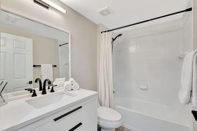 full bathroom featuring vanity, toilet, and shower / tub combo with curtain