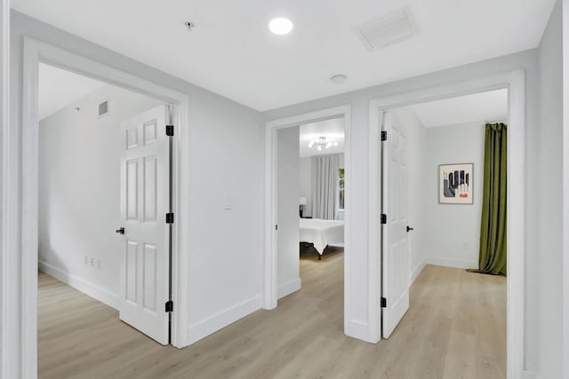 hall featuring light hardwood / wood-style flooring