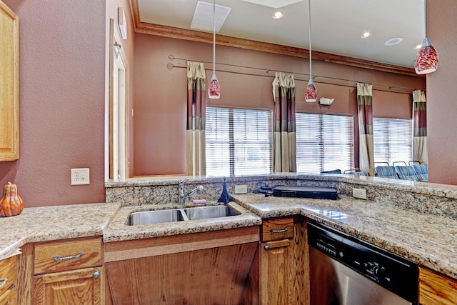 kitchen with pendant lighting, sink, and stainless steel dishwasher