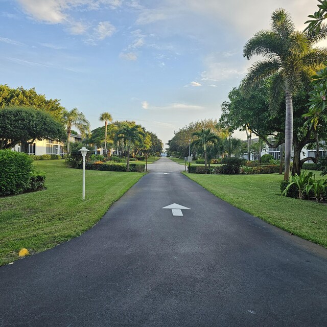 surrounding community with a lawn