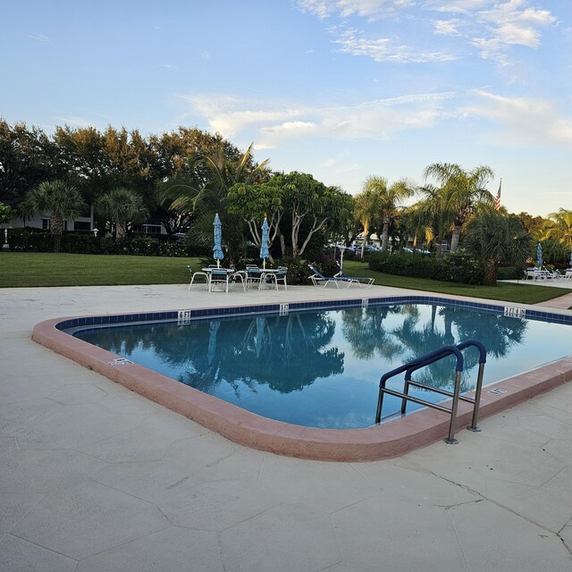 view of water feature with a beach view