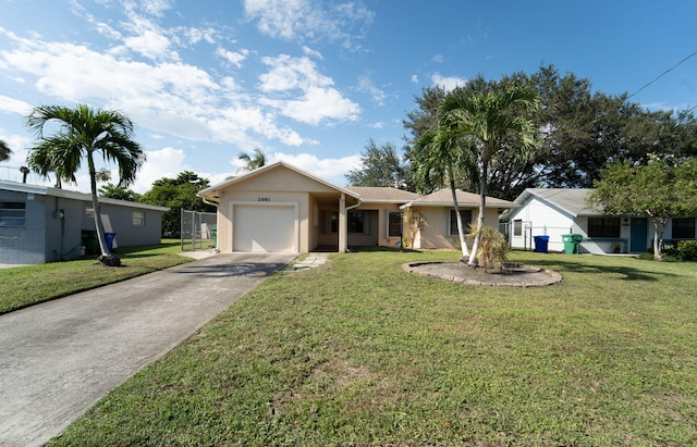 ranch-style home with a front yard and a garage