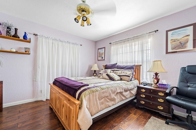 bedroom featuring dark wood-type flooring