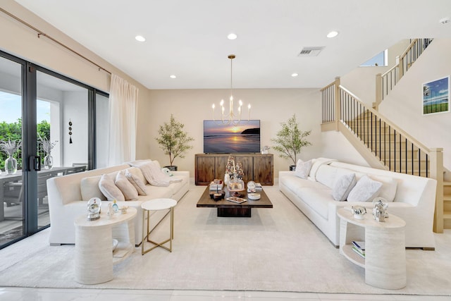 living room with an inviting chandelier