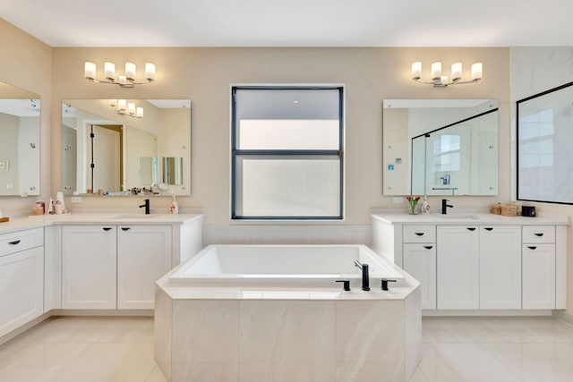 bathroom featuring vanity, plus walk in shower, and tile patterned floors