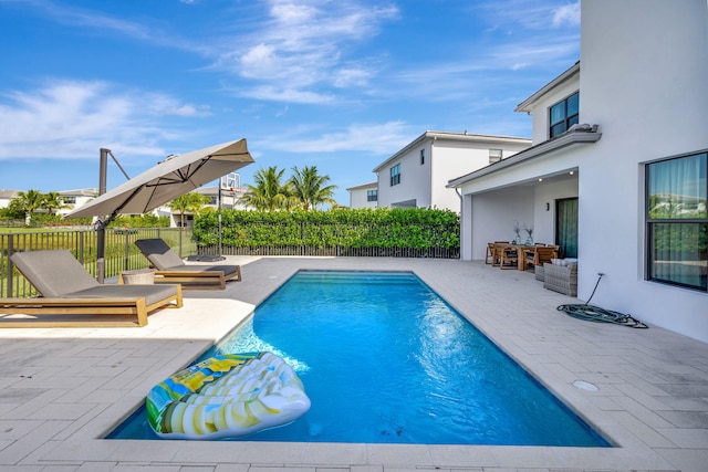 view of pool with a patio area