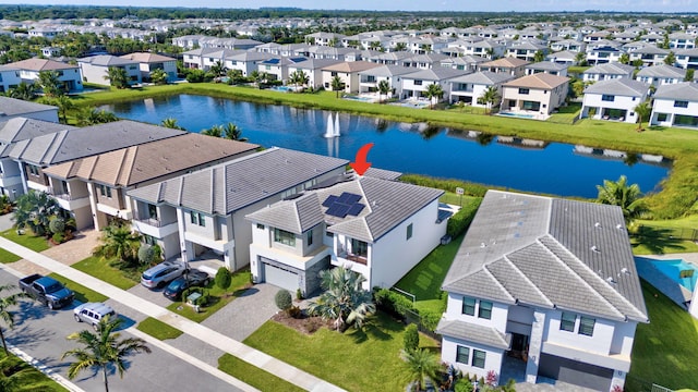 bird's eye view with a water view