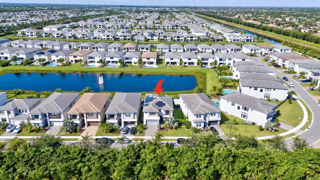 drone / aerial view featuring a water view