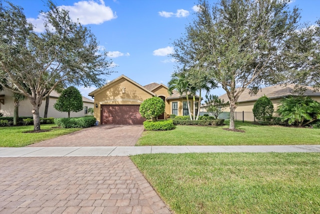 view of front facade featuring a front lawn and a garage