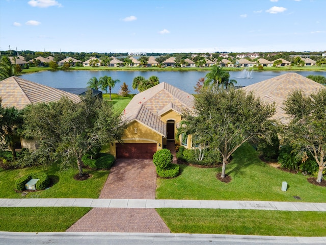 drone / aerial view with a water view