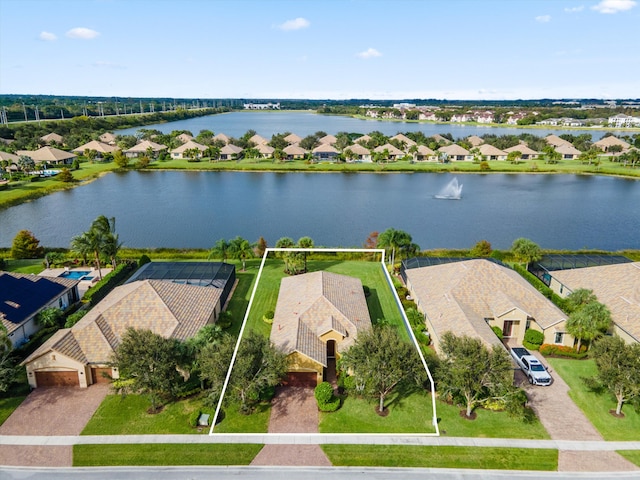 drone / aerial view with a water view