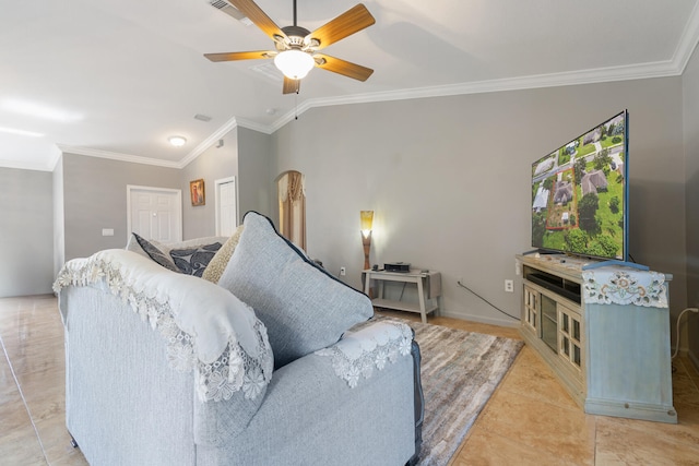 living room with ornamental molding, lofted ceiling, ceiling fan, and light tile patterned floors