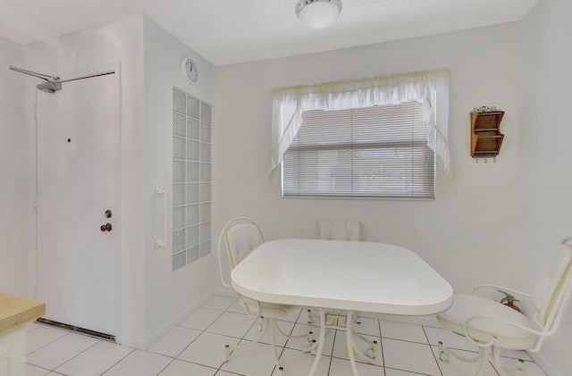 view of tiled dining space