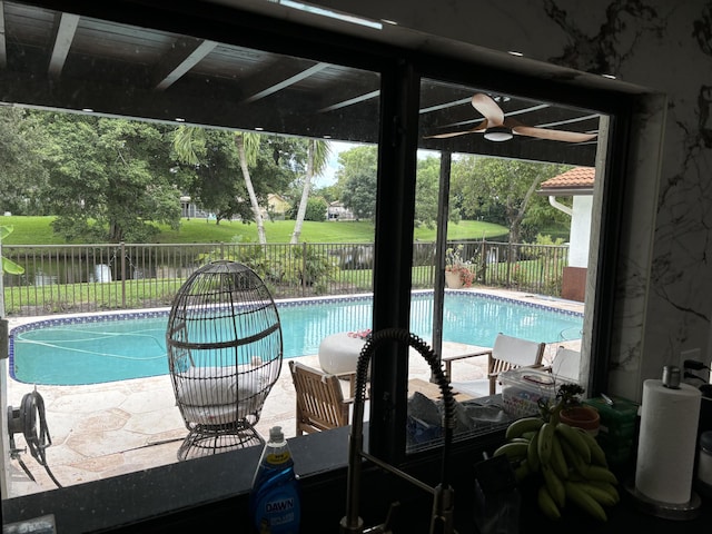 view of swimming pool with a patio area