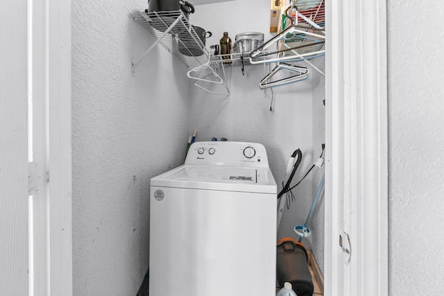 laundry room featuring washer / dryer