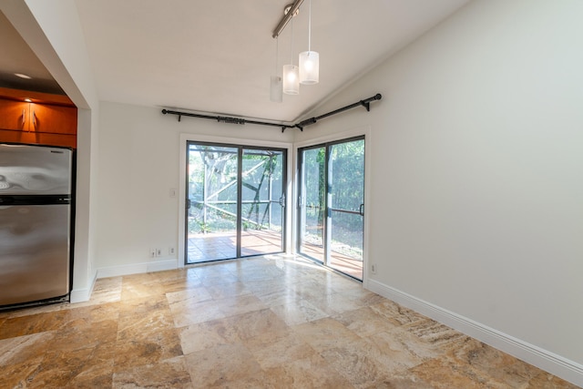 interior space featuring vaulted ceiling