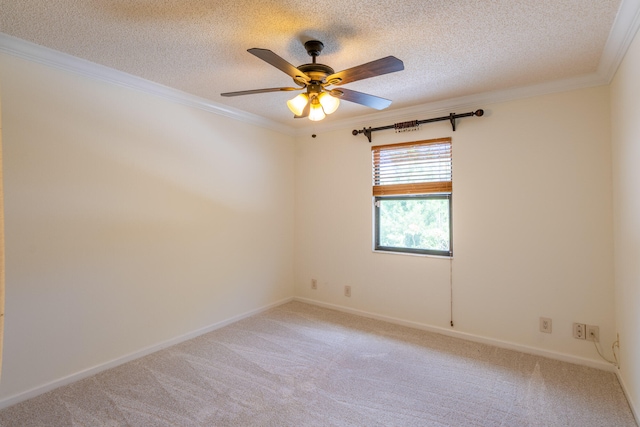 empty room featuring crown molding, light carpet, a textured ceiling, and ceiling fan